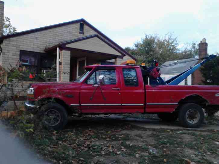 Ford f250 wrecker with a Holmes boom (1996)