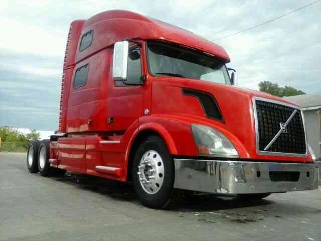 Red Volvo 780 Semi Truck