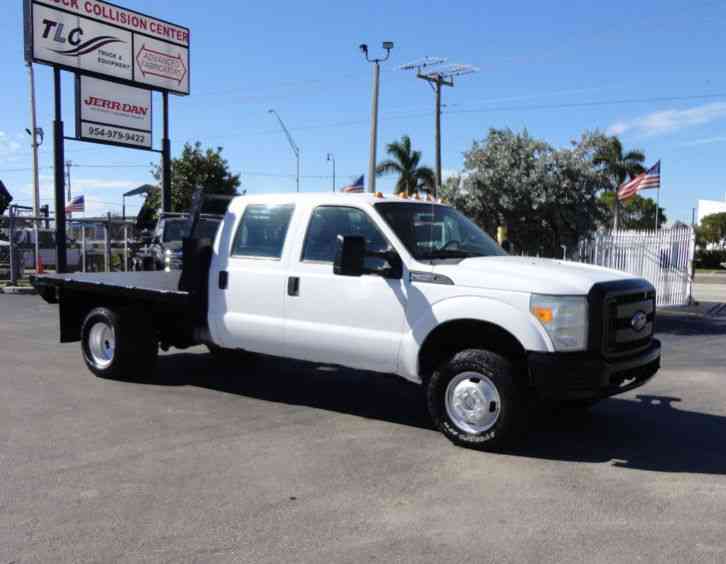 Ford F350 XL. . 4X4 CREW CAB 8FT STEEL FLATBED. . (2011)