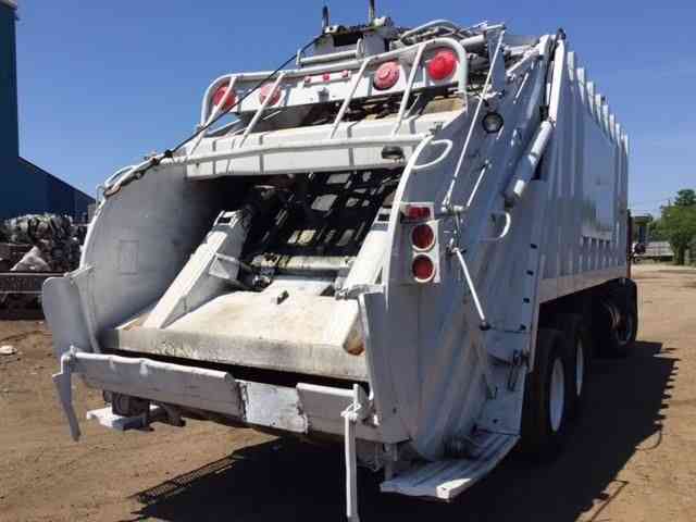 rear loader mack garbage truck