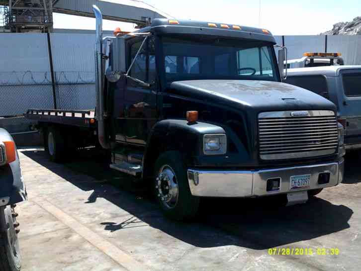 Freightliner FL60 Extended Cab roll back Chevron Series 14 Carrier (1998)