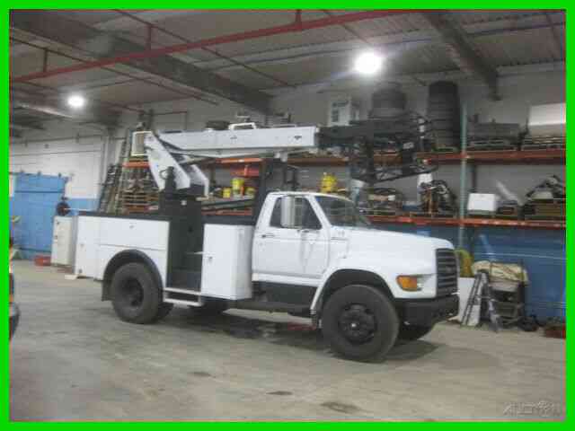 FORD F800 5. 9 CUMMINS ALLISON WITH ALTEC AP36 CABLE PLACER. . Used ALTEC (1999)