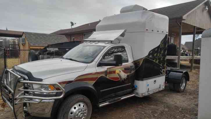 2012 ram 5500 with stand up sleeper, roof air, satelight dish, refrigerator...