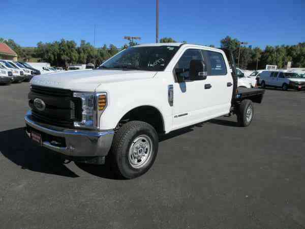 FORD F250 DSL 55799 Miles WHITE CREW CAB FLAT BED V8, 6. 7L; TURBO AT (2019)