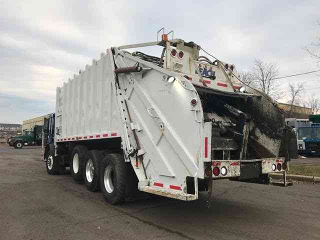 rear loader mack garbage truck